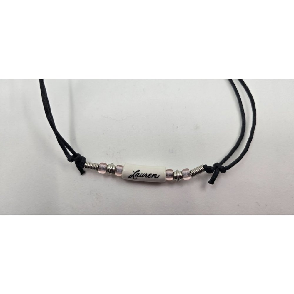Vintage Name Necklace Lauren Emblazoned on white stone